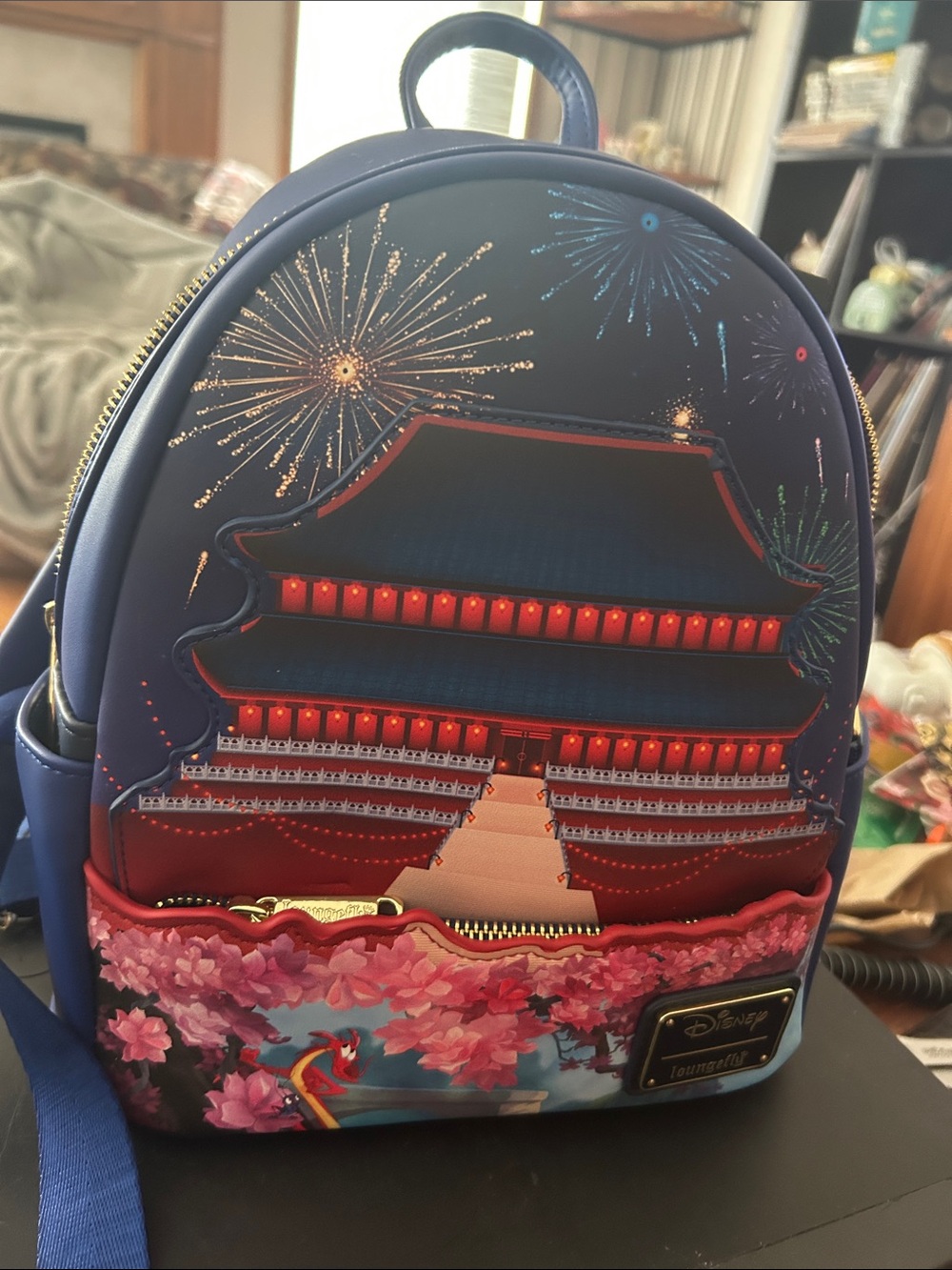 Loungefly Mulan Pagoda Fireworks Mini Backpack lights up